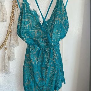 Turquoise lace romper